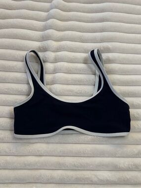 Athleta navy bra with white piping size small